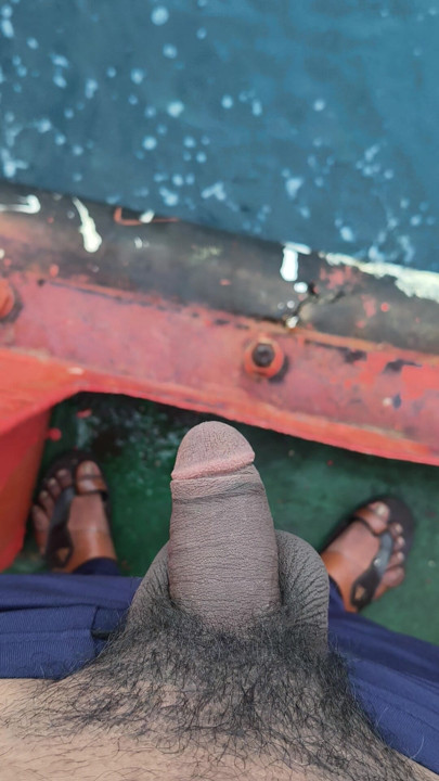 Peeing in the sea.