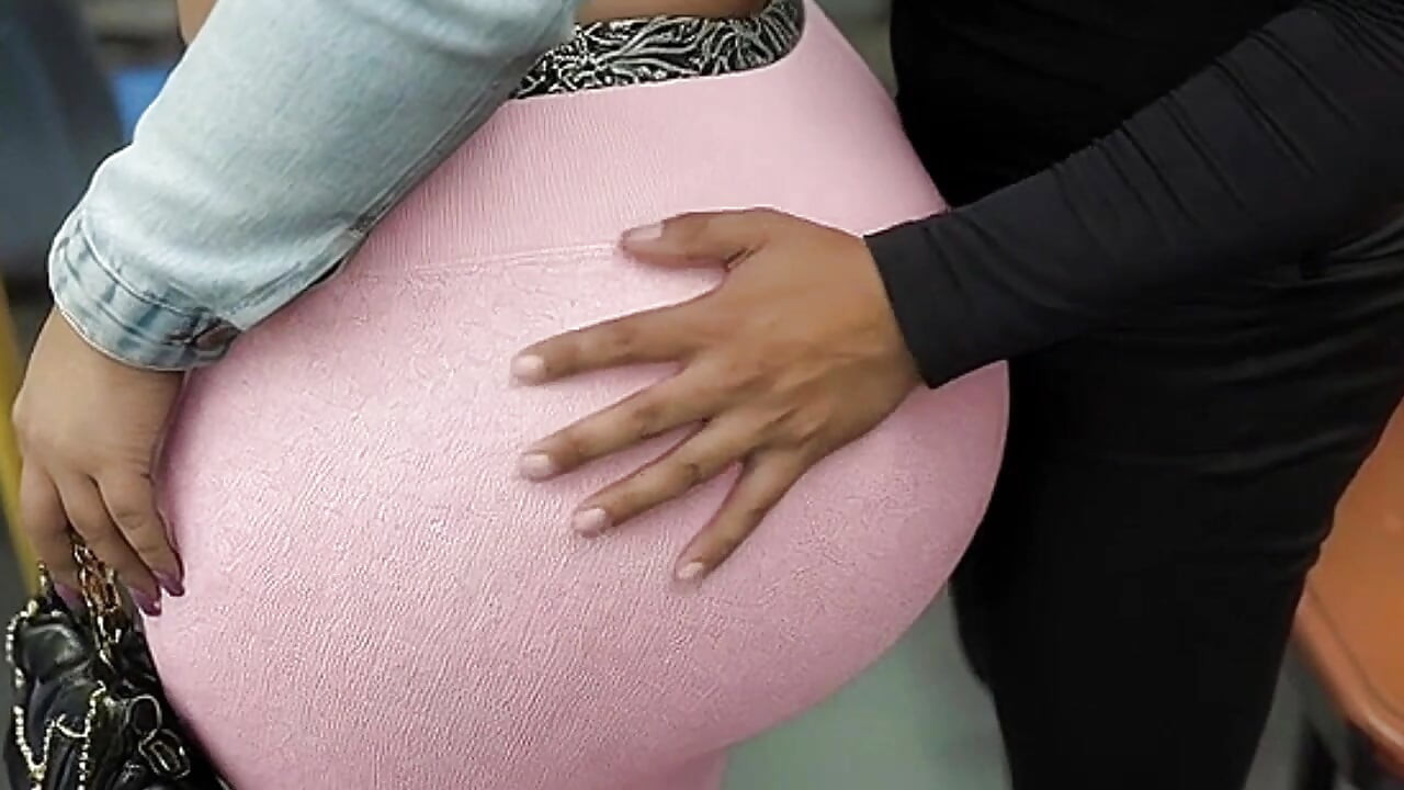 "Balaclava BBW Gets Ass  in Tight Shiny Pink Pants - Public Bus"