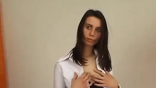 Gorgeous brunette teen stripping her clothes