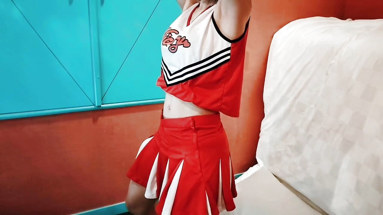 A cute busty married woman exercises 2 in a sexy cheerleader costume. Home made amateur Private Shoot