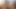 ストラポンズ・ガールズのシーン1_a美しいブルネットのレズビアンカップルがストラップオンでセックスを楽しんでいます。