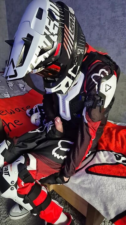 An Excited Guy in Motorcycle Gear Fucks His Sneakers