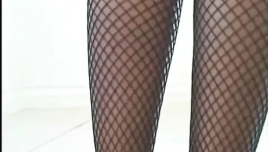 Busty ebony in fishnets gets doggy style fuck