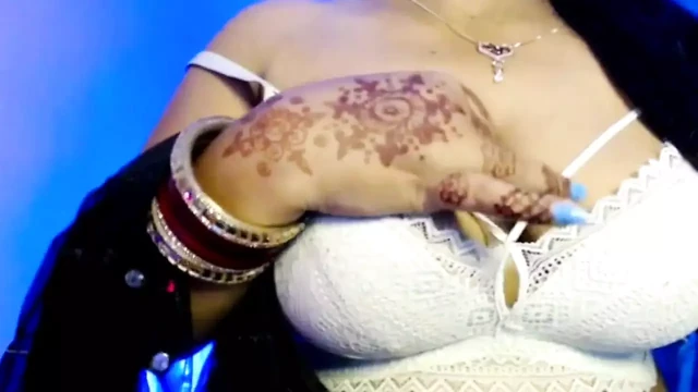 The Young Girl Opened Her White Bra and Pressed Her Boobs with Pleasure