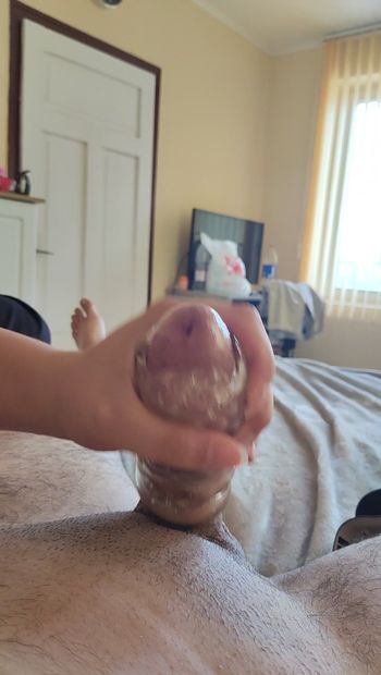 Wife giving a handjob with fake pussy ,man wants to cum