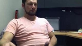 Handsome dude jerking at office