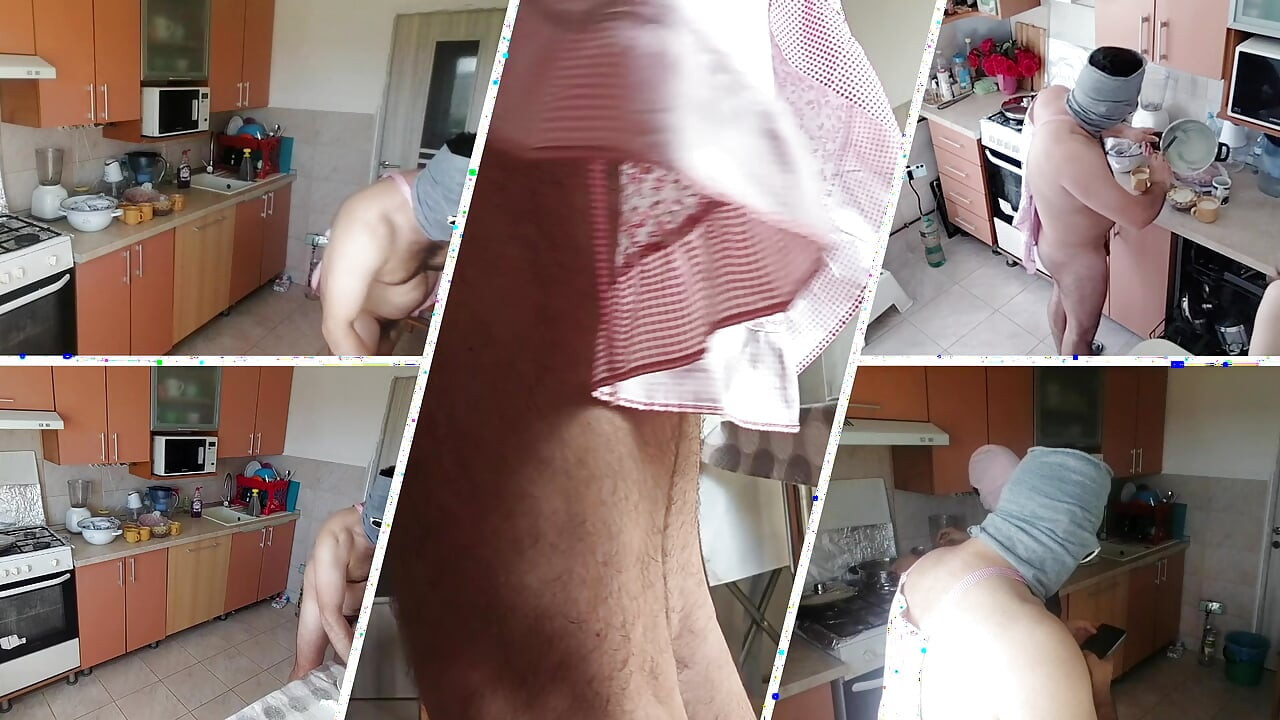 Amateur couple having fun in the kitchen. A sexy hairy brunette does the housework naked.