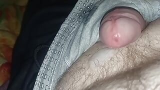 chubby guy jerks off cock through pants and cums