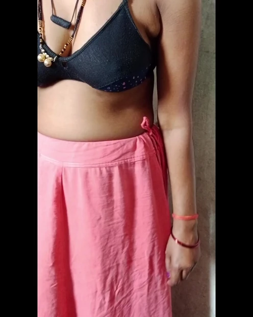Bhabhi is showing her big breasts while wearing a bra