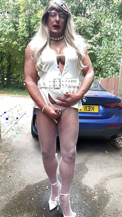 Sexy Crossdresser kellycd2022 in sexy white mini dress and fishnet pantyhose and heels