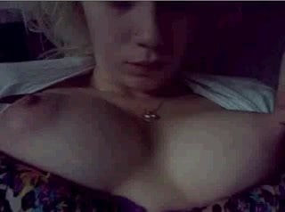 sexy girl at phone with pretty nipples
