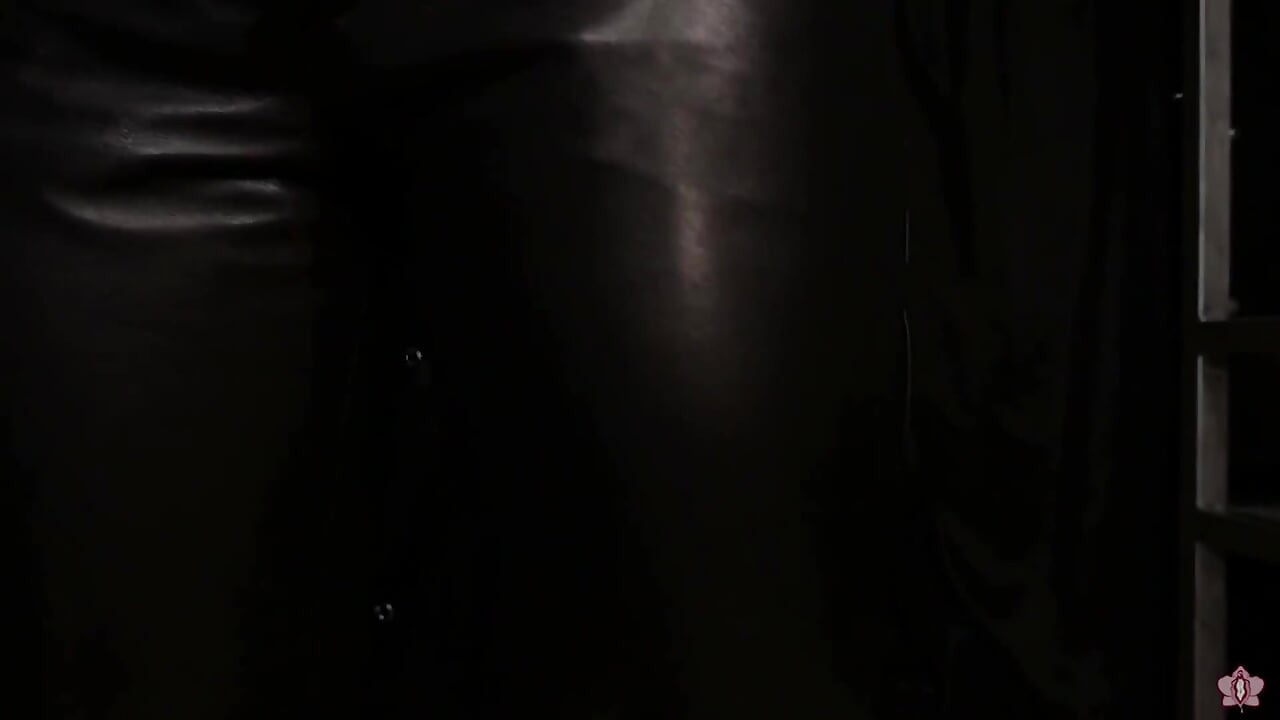 Lady Amber Encases Slave Mila Layers of Leather