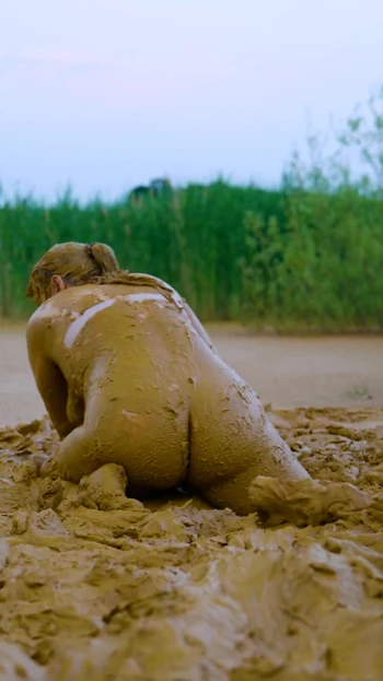 Captivating moment from "Orgasm in lake of mud - masturbating in clay"