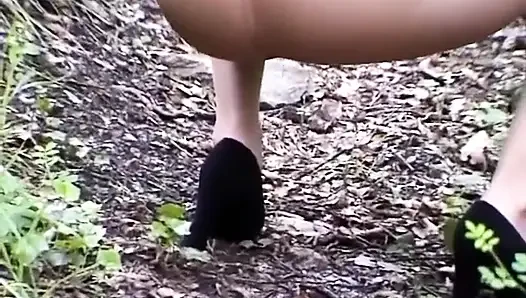 Kitten in outdoor pissing