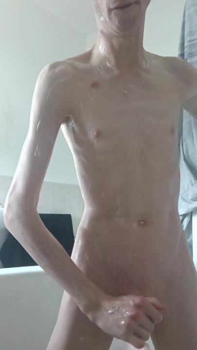 Nude bi chav washing himself while rock hard cock stiff wet through  all on show