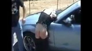 spanked over car