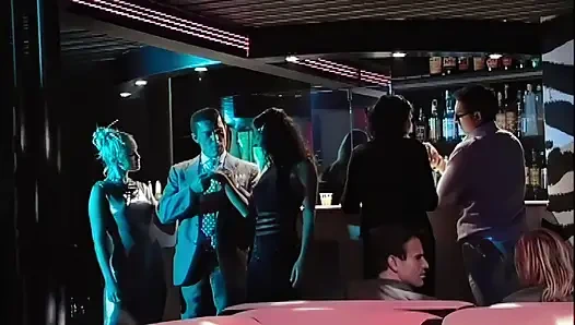 2 Sluts Share an Italian Cock in a Nightclub Among the People