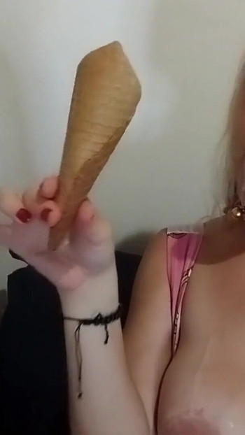 Stunning moment from "PETITE BLONDE MASTURBATES WITH ICE CREAM."