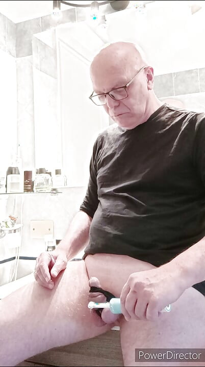 small caged cock and toothbrush