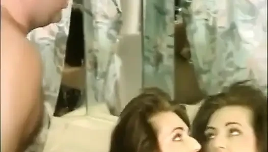 A bathtub serves as a kissing ground.