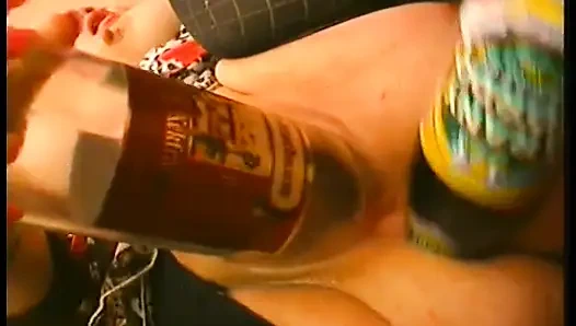 Clothed chubby mature slut drilling her holes with bottles and banana