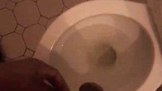 Black cock taking a piss