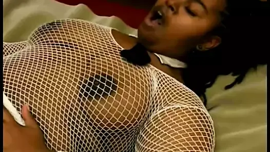 Black lesbians in fishnets and boots eat pussies and use toys