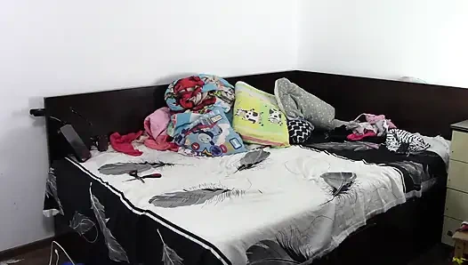 Sexy brunette doing naked chores around the house.