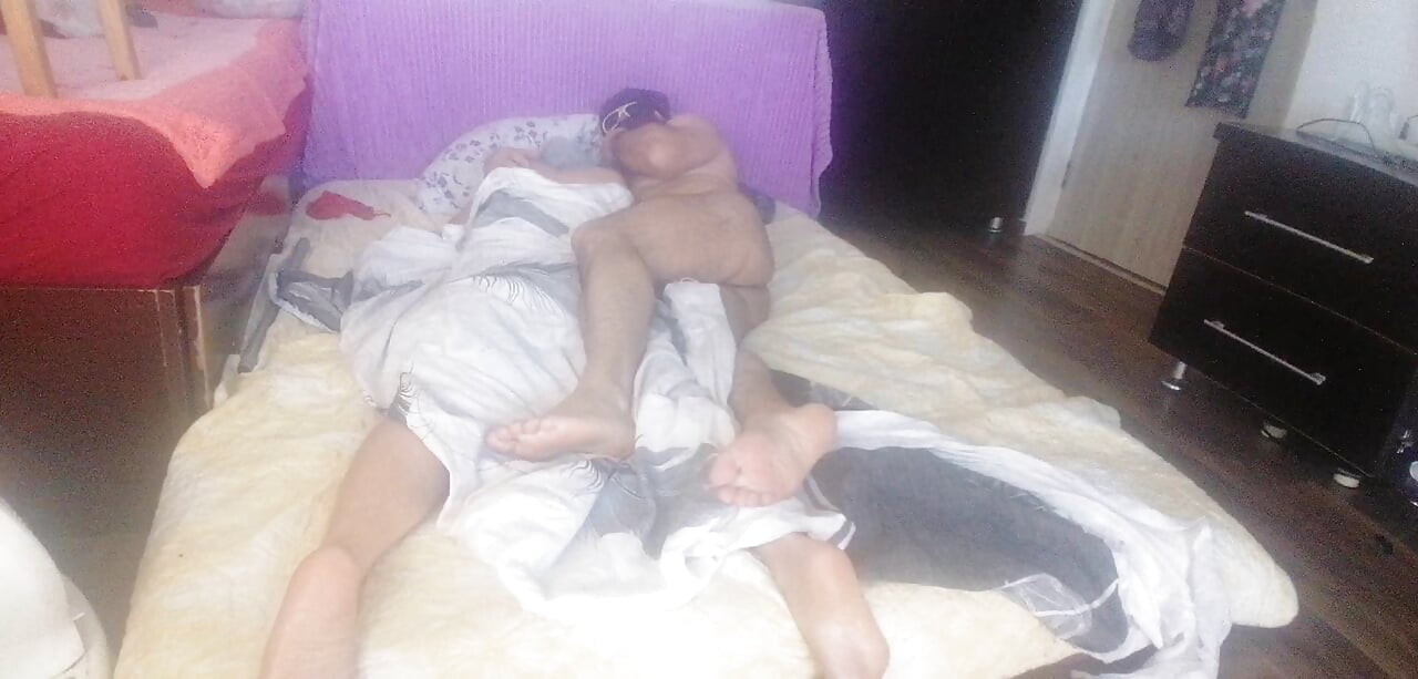 Sensual massage of a hot couple with oil on the body.