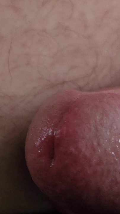 Extremely close up pre cum cock eye