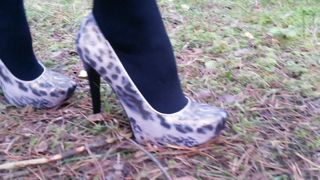 Lady L walking with leopard high heels.