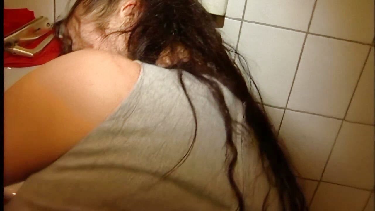 Cute Brunette Blows a Hot Cock on the Toilet
