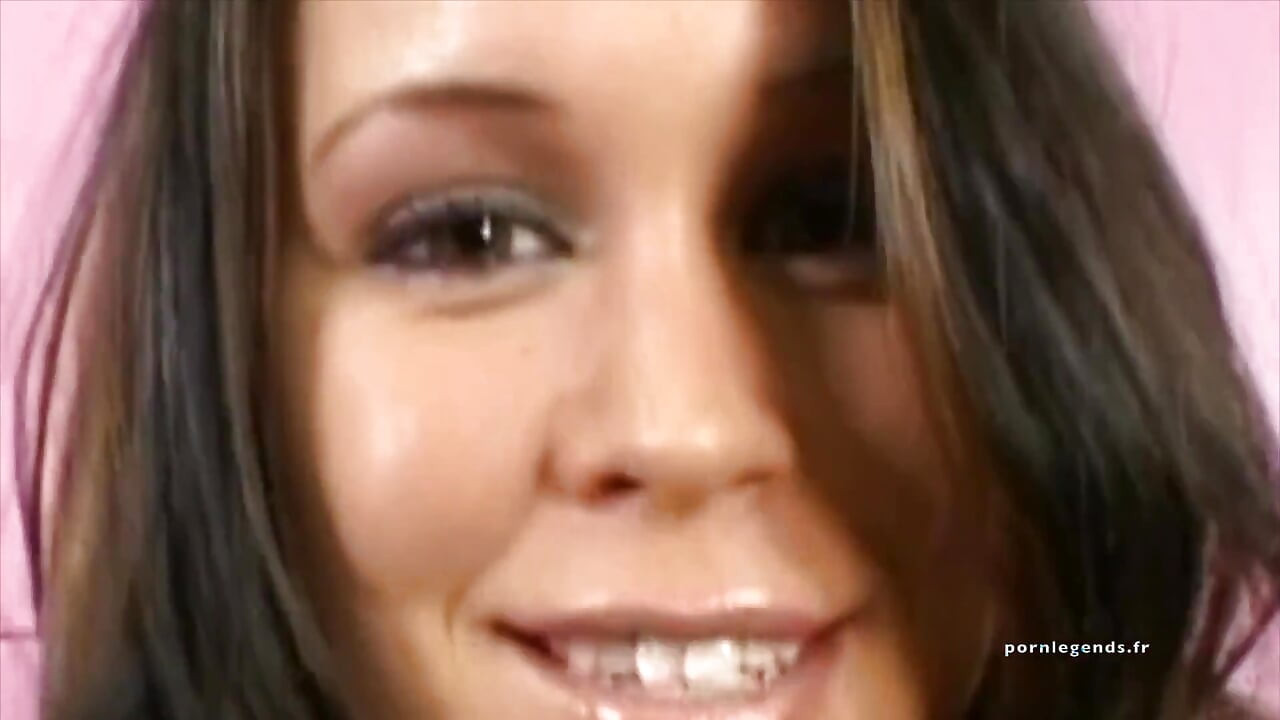 Brandy Talore jerks off a cock with her big tits