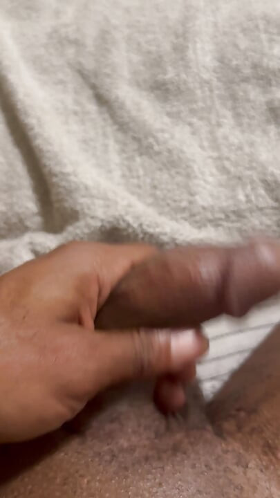 Big Black Dick Slowly Let's Cum Slime From The Head Off His Cock