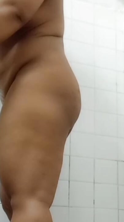 Sexy widow show off her boobs and jumbo ass in the bathroom