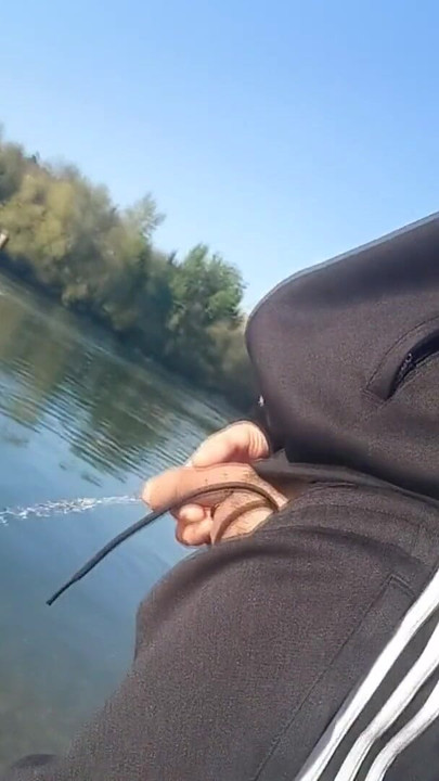 Who will spot this twink in a black and white adidas tracksuit, flashing his cock in public going commando freeballing, peeing i | Clip 1
