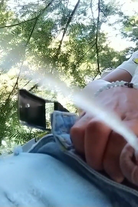 Peeing in the Park Behind a Tree