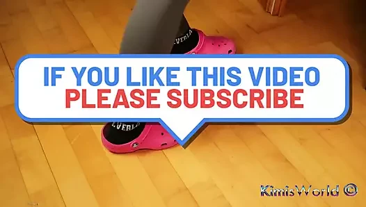 Under Desk Foot Play - Pink Clogs and Worn Socks