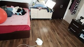 Amateur wife dancing naked at home. Amateur woman has fun trying on clothes and cutting them.