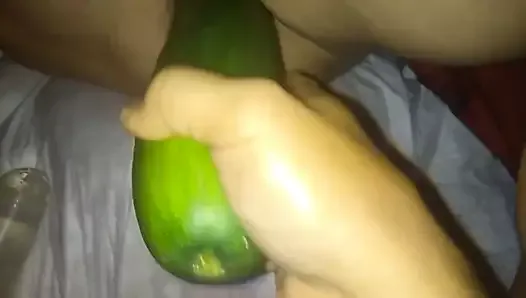 I fuck my wife's hot pussy with a huge cucumber.