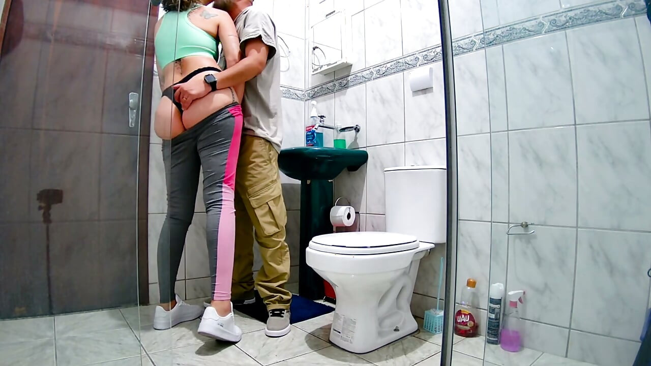 Mistress getting intimate in the bathroom after a workout.