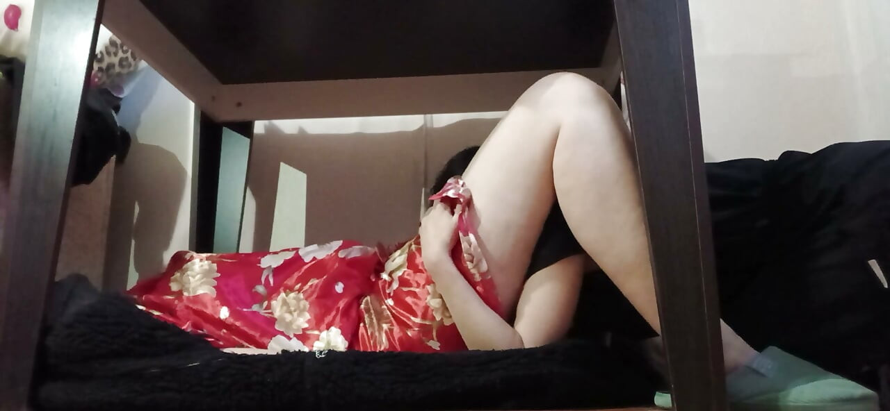 I’m under the table, licking my Japanese neighbor’s pussy