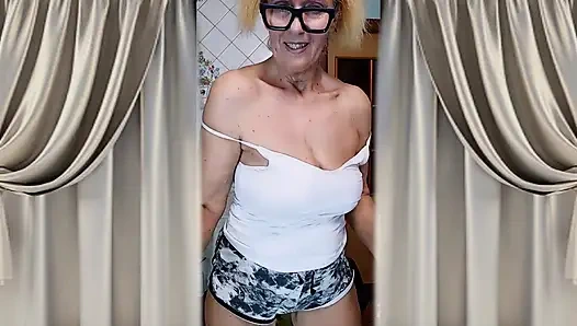 Hot housewife Lukerya flirts in home clothes and entices with her bare feet.