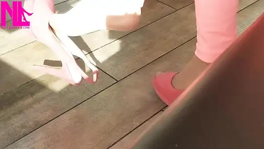 Shoeplay with High Heels in a Bar