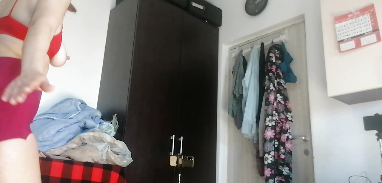 Amateur wife has fun trying on clothes and cutting them. Amateur wife sucking naked in the house