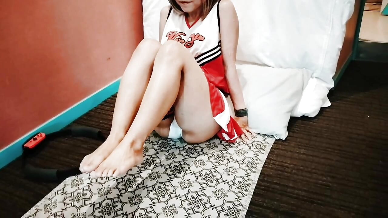 A cute, busty married woman does exercise 1 in an erotic cheerleader costume. Home made amateur Private Shoot