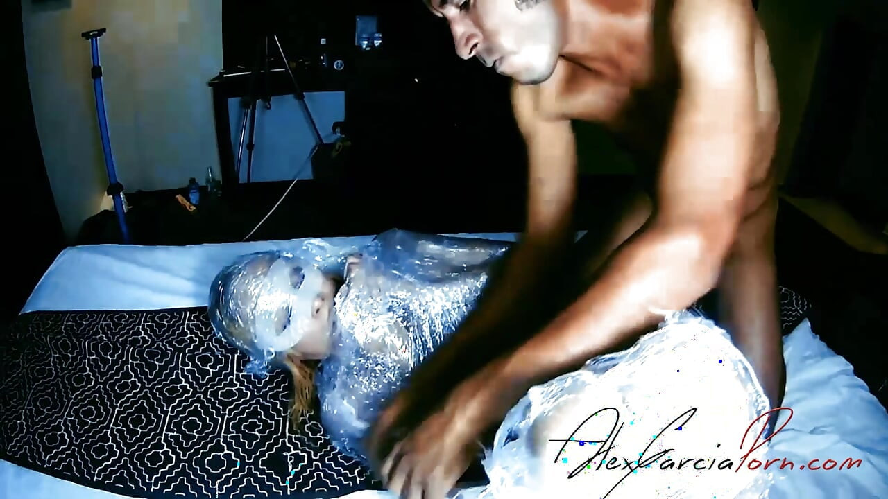Skinny woman is wrapped in plastic and fucked in holes - Porn in Spanish