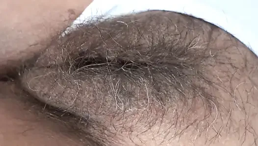On vacation at the beach, stepmom flashes herself in front of stepson so he can jerk off while she rests