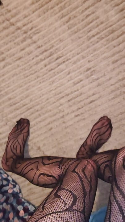 Teasing My Fishnet Stocking