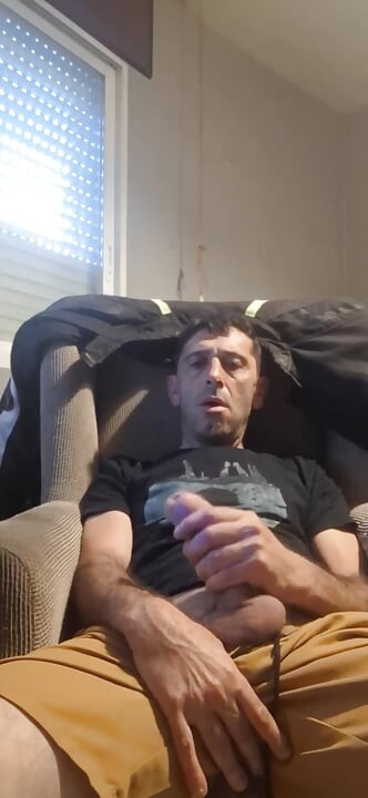 Guy masturbating on the sofa